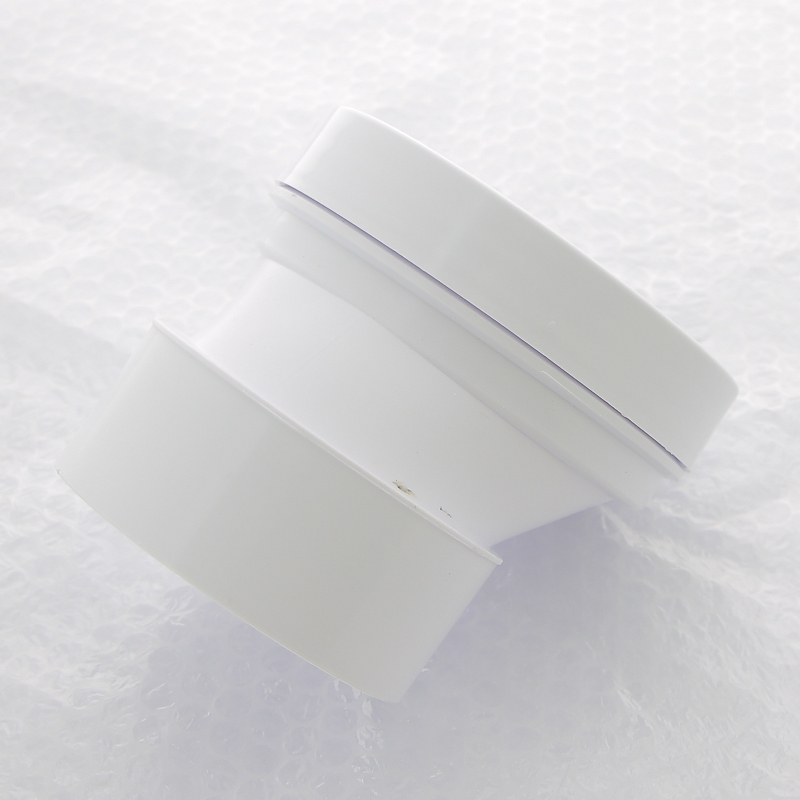 Труба McALPINE фановая L=125 мм с манжетой и 40 мм смещ., вход 97-107 мм, выход внутрь 110 мм трубы