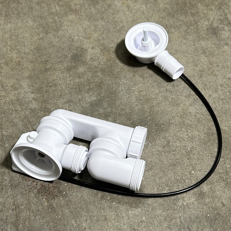 Слив-перелив McALPINE L=575 х 34 мм неразборный с ревизией, 70 мм слив.,выход 40/50 мм, хром, пакет