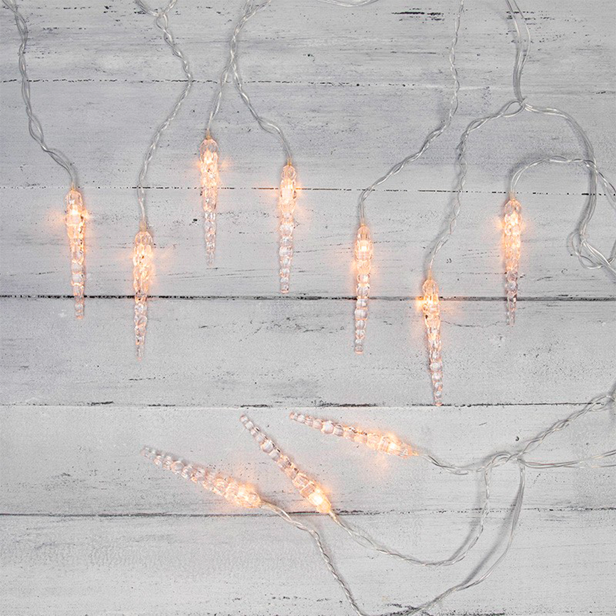 Электрогирлянда "сосульки" 1,5*0,25 м, 10 теплых ламп, шнур прозр. (1/100) "neon-night" 303-067