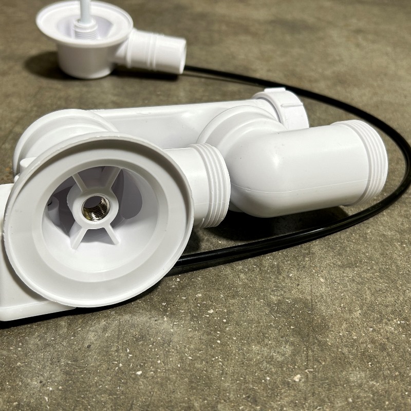 Слив-перелив McALPINE L=575 х 34 мм неразборный с ревизией, 70 мм слив.,выход 40/50 мм, хром, пакет