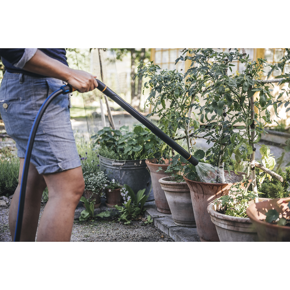 Штанга-распылитель, регулируемая насадка (1/4) "fiskars" 1052185