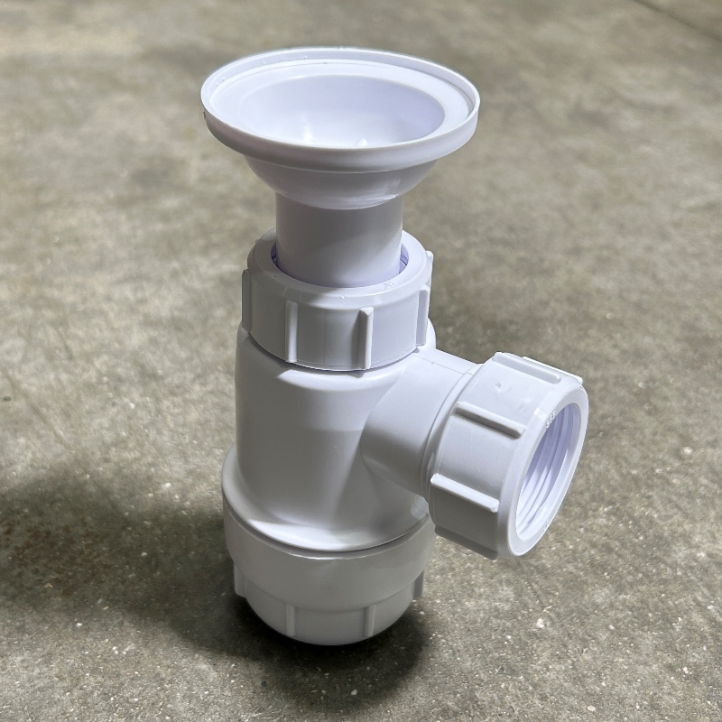 Сифон McALPINE бутылочный 1 1/4" x 32 мм с выпуском 60 мм нерж. реш. и пробкой, выход 32 мм компрес.